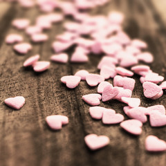 Obraz na płótnie Canvas Valentines Day background with candy hearts. Sugar Hearts on woo