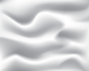 texture background of white flowing silk fabric