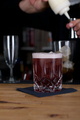 Picture of a fresh cocktail on a bar desk