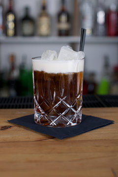 Picture of a fresh cocktail on a bar desk