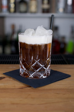 Picture of a fresh cocktail on a bar desk
