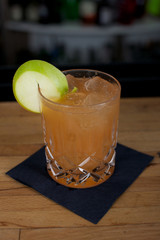 Picture of a fresh cocktail on a bar desk