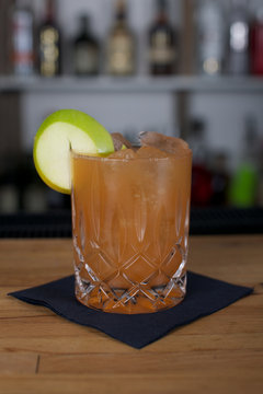 Picture of a fresh cocktail on a bar desk