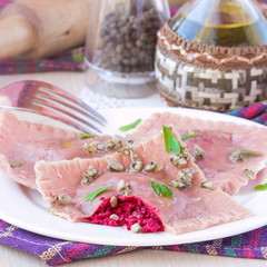 Italian pink pasta ravioli with beet filling