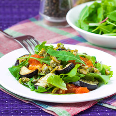 Salad with grilled vegetables, eggplant, tomatoes, lettuce sauce