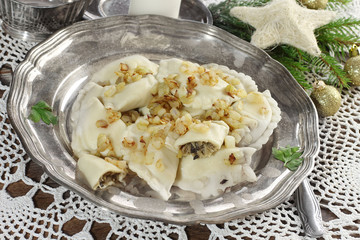 homemade pierogi (ravioli) with mushroom and sauerkraut. 