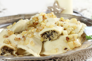 homemade pierogi (ravioli) with mushroom and sauerkraut. 