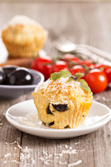 Savoury muffins with tomatoes, cheese and olives