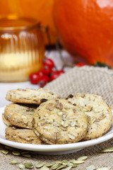 Pumpkin cookies in autumn setting