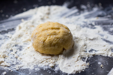 Fototapeta na wymiar Mixed dough for Italian pasta or pizza