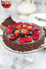 Chocolate cake decorated with fresh fruits