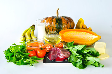 Group of foods with Vitamin A isolated on white