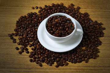 Fototapeta na wymiar a Cup of Robusta Coffee Beans
