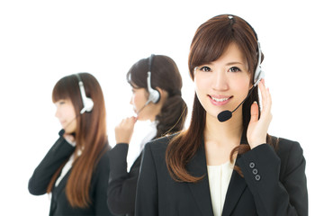 Beautiful asian business operator isolated on white background