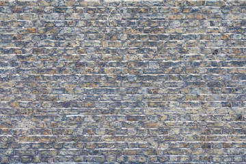 Muri di mattoni chiari di tonalità diverse