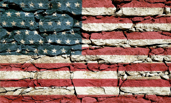 Texture of stone wall with a picture of an American flag.