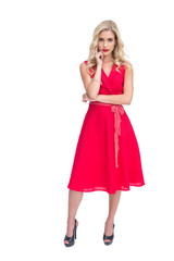 Thoughtful woman looking at camera