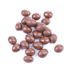Dark brown dragee in chocolate covered.