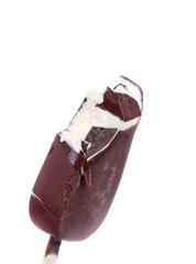 Bitten chocolate vanilla ice cream on stick