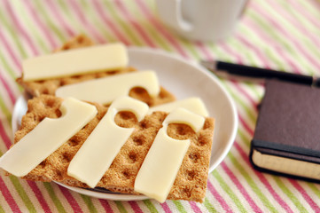 Light snack: crispbread and Emmental cheese