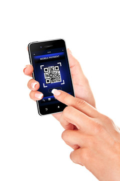 hand holding mobile phone with qr code screen isolated over whit