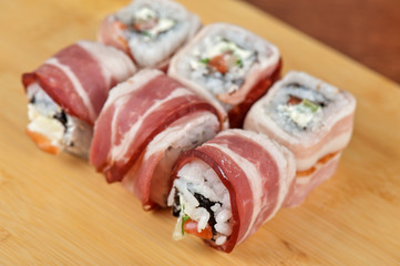 Sushi roll with bacon