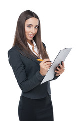 Fototapeta premium business woman writing something down on the plane table.