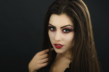 Fototapeta premium beautiful woman with halloween makeup isolated on black backgrou