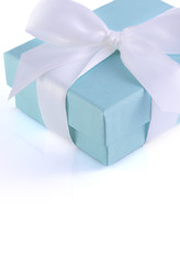 Small gift box with white ribbon isolated.