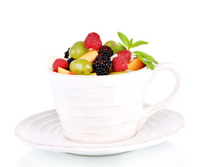 Fruit salad in cup isolated on white
