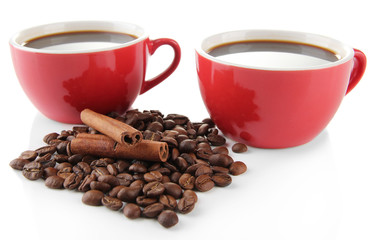 Red cups of strong coffee and coffee beans isolated on white