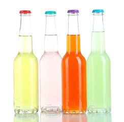 Drinks in glass bottles isolated on white