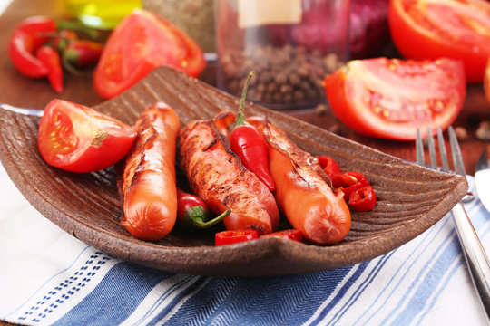 Delicious sausages with vegetables
