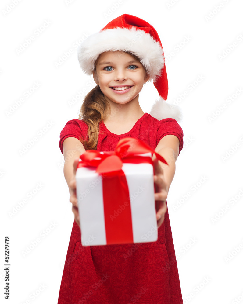 Canvas Prints smiling girl in santa helper hat with gift box