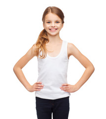 Fototapeta premium smiling teenage girl in blank white shirt