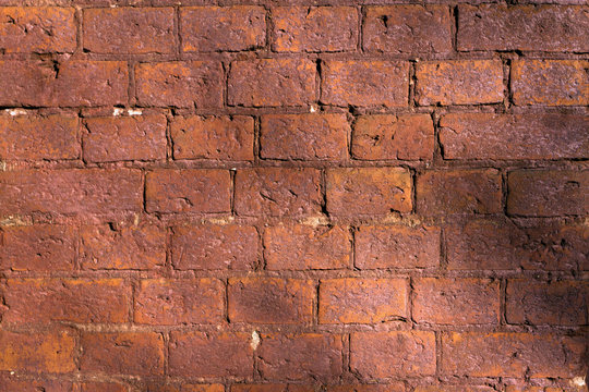 Wall Of Dark Red Brick