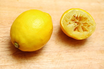 Lemon fruit on wooden table board background
