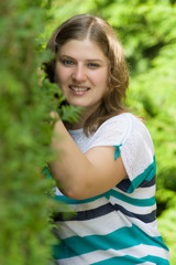 Fototapeta premium Portrait of an attractive woman in the park
