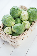 Wicker tray with brussels sprouts, high angle view