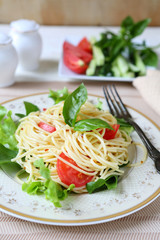delicious spaghetti with tomato and basil