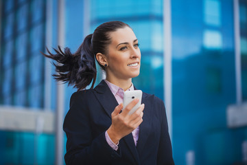 businesswoman, on the modern building background