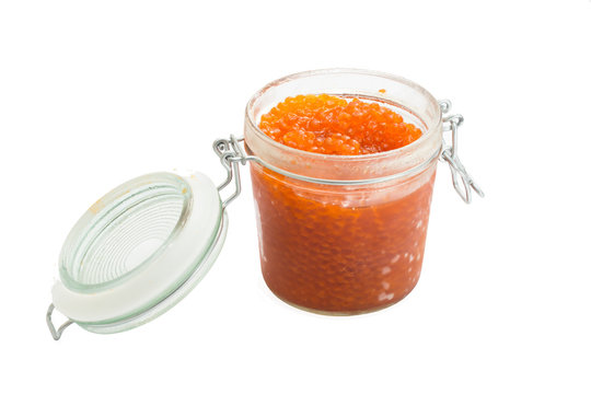 Isolated salmon roe in a bottle on white background