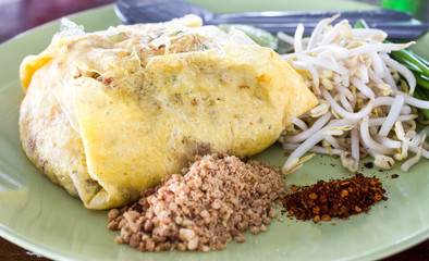 Naklejka na ściany i meble Thailand's national dishes, stir-fried rice noodles (Pad Thai)