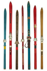 Vintage colorful used skis isolated on white