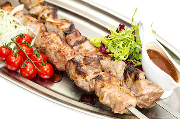 kebab meat sauce and salad vegetables