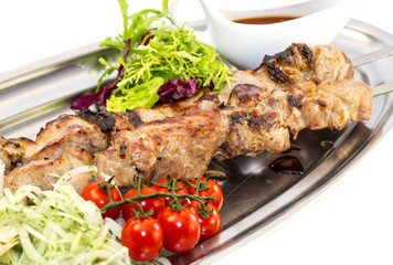 kebab meat sauce and salad vegetables