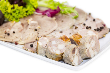 meat dish with several kinds of sausages