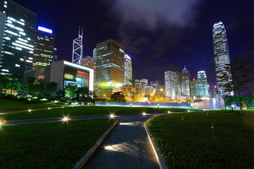 modern office building in downtown city at night