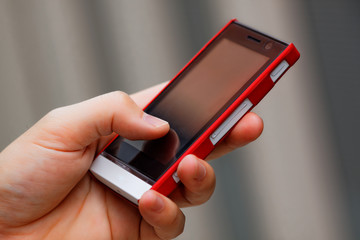 Mobile phone in man hand