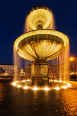 Fountain in the Geschwister-Scholl-Platz in the evening. Munich,